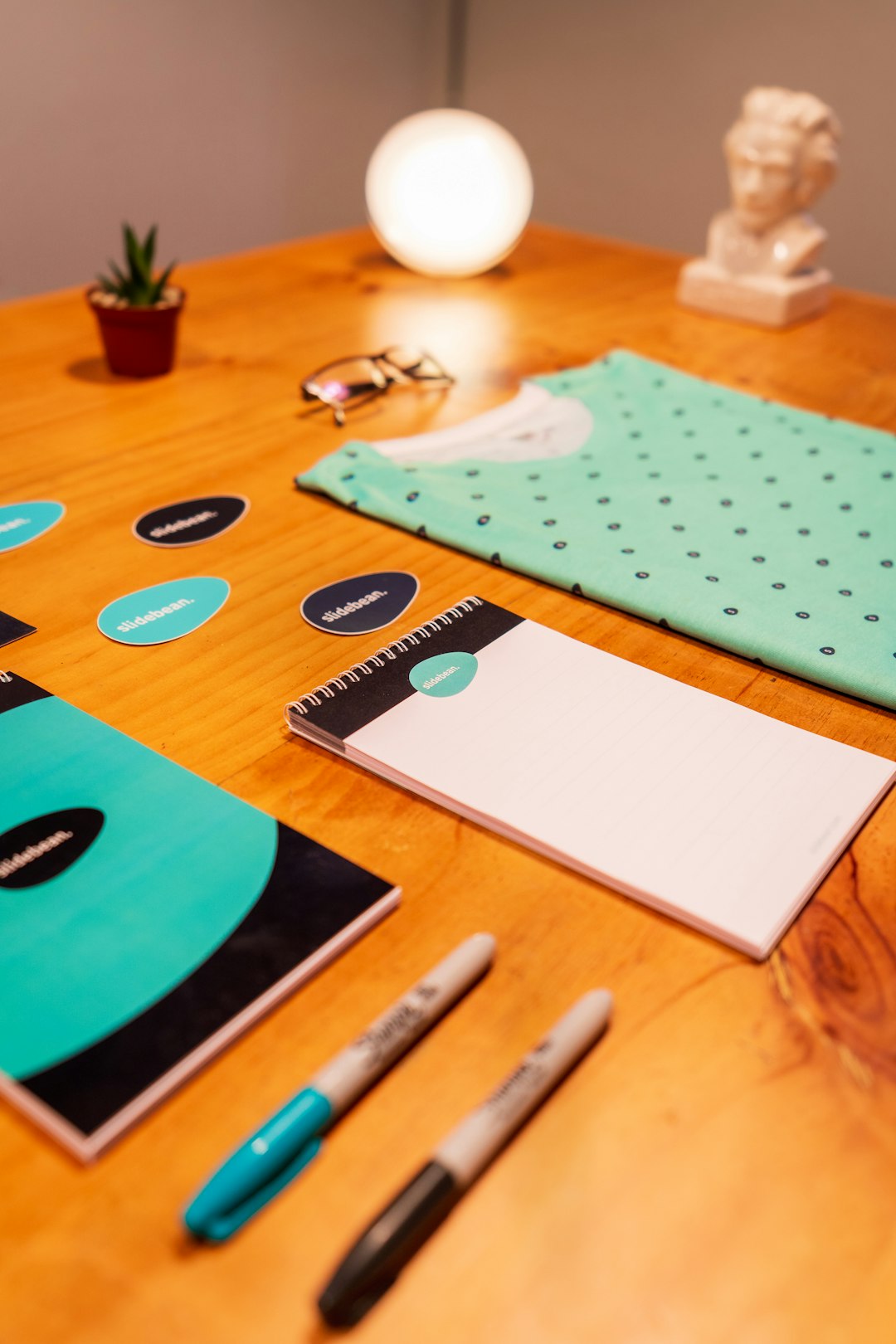white-and-blue-polka-dot-paper-on-brown-wooden-table-1ulrm7fijko
